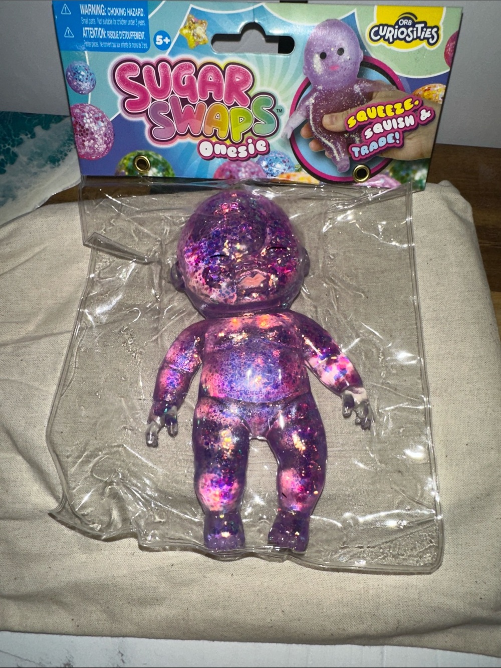 Onesie Glitter Squishy Doll - Purple
